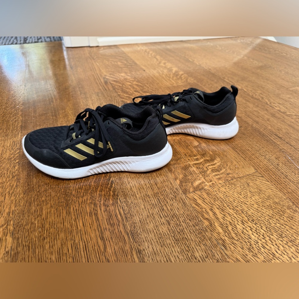Adidas Women's Black Sneakers with Gold Stripes
